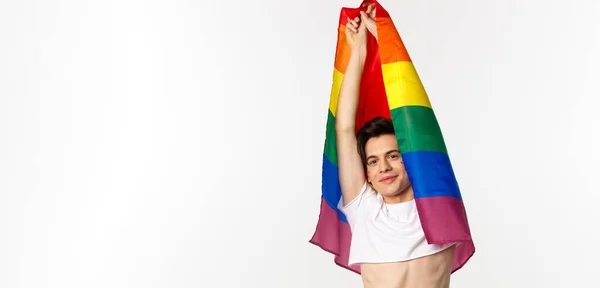 Vertical View Beautiful Androgynous Gay Man Raising Rainbow Flag Smiling — Stock Photo, Image