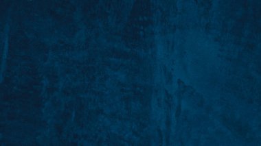 Empty Dark Concrete wall room studio Background and Floor perspective with blue soft light. Displays product and text present on free space cement. Backdrop