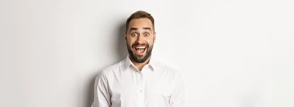 Close Caucasian Bearded Man Looking Excited Standing Amazated White Background — Stok Foto