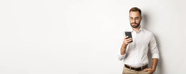 Businessman Reading Message Phone Standing White Background — Stock Photo, Image