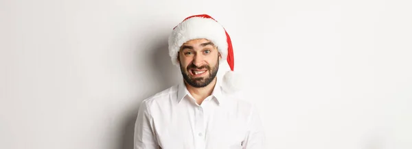 Close Awkward Guy Santa Hat Apologizing Feeling Uncomfortable Standing White — Stock Photo, Image
