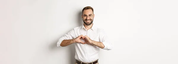 Handsome Manage Showing Heart Sign Smiling Love You Gesture Standing — Stock Photo, Image