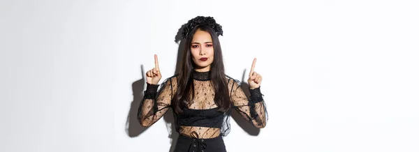 Disappointed Skeptical Asian Female Black Dress Wreath Looking Displeased Pointing — Stock Photo, Image