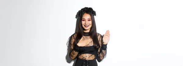 Imagem Bonito Menina Asiática Sincera Traje Halloween Fazendo Promessa Segurando — Fotografia de Stock