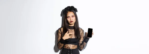 Cadı Kostümlü Rahatsız Gönülsüz Asyalı Kız Görüntüsü Gözlerini Devirme Cep — Stok fotoğraf