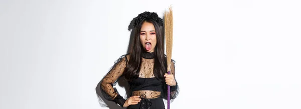 Carefree Sassy Asian Woman Enjoying Halloween Party Wearing Witch Costume — Stock Photo, Image