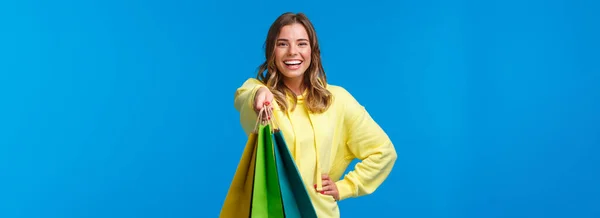 Cheerful Blond Girl Giving You Shopping Bags Smiling Happy Buying — Stock Photo, Image