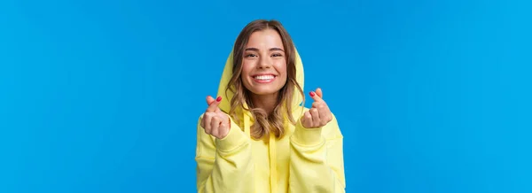 Close Portrait Cute Silly Blond Caucasian Girl Yellow Hoodie Showing — Stock Photo, Image