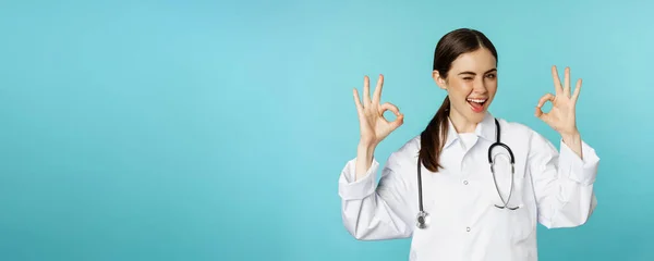 Smiling Woman Doctor Professional Medical Worker Showing Okay Sign Approval — Zdjęcie stockowe