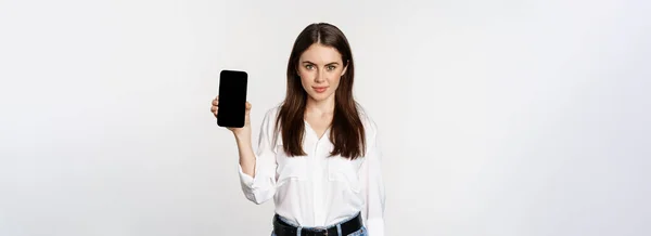 Confident Woman Corporate Clothes Showing Smartphone Screen Mobile Interface Application — Foto de Stock