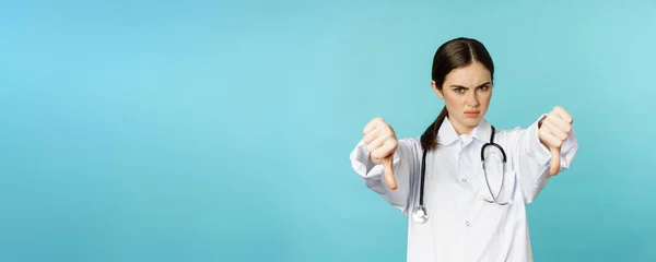 Woman Doctor Medical Worker Showing Thumbs Frowning Angry Dislike Disappove — Foto de Stock