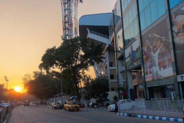 Kolkata, West Bengal, India - 12th January 2020 : Setting sun behind The Eden Gradens, office of the CAB or Cricket Association of Bengal. World famous cricket stadium of Kolkata.