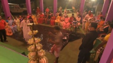 Howrah, India - October 15th, 2021: Vog, food for Goddess brought in before Sandhi Puja, the sacred juncture of Ashtami and Nabami, as Hindu ritual for praying to Goddess Durga.Durga puja festival.