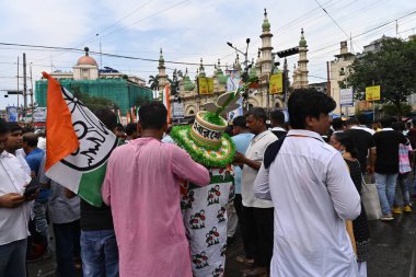 Kolkata, West Bengal, India - 21st July 2022 : All India Trinamool Congress Party, AITC or TMC, at Ekushe July, Shadid Dibas, Martyrs day rally. Party supporters with flags at Esplanade, Dharmatala.