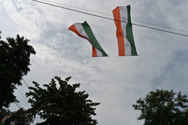 Kolkata, West Bengal, India - 21st July 2022 : All India Trinamool Congress Party, AITC or TMC, at Ekushe July, Shadid Dibas, Martyrs day rally. Party flags are lying high in the sky.