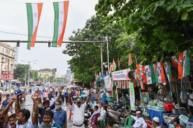 Kolkata, West Bengal, India - 21st July 2022 : All India Trinamool Congress Party, AITC or TMC, at Ekushe July, Shadid Dibas, Martyrs day rally. Party supporters cheering on street.