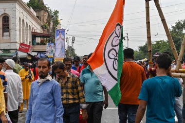 Kolkata, West Bengal, India - 21st July 2022 : All India Trinamool Congress Party, AITC or TMC, at Ekushe July, Shadid Dibas, Martyrs day rally. Party supporters with flags at Esplanade, Dharmatala.