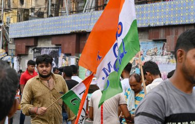 Kolkata, West Bengal, India - 21st July 2022 : All India Trinamool Congress Party, AITC or TMC, at Ekushe July, Shadid Dibas, Martyrs day rally. Party supporters with flags at Esplanade, Dharmatala.