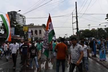 Kolkata, West Bengal, India - 21st July 2022 : All India Trinamool Congress Party, AITC or TMC, at Ekushe July, Shadid Dibas, Martyrs day rally. Party supporters with flags at Esplanade, Dharmatala.