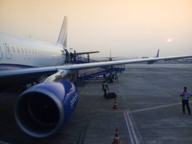 Kolkata, West Bengal, India - 3rd December 2019 : Indigo flight is ready for departure at Kolkata air port. Flight runway of Netaji Subhas Chandra Bose International Airport.
