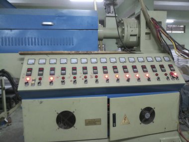 Kolkata, West Bengal, India - 16th May 2019 : State of the art modern machineries PE coating cup stock white Papers in a big Cup paper coating plant. Plastic ban increases use of paper cups.