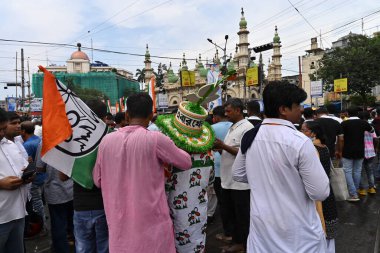 Kolkata, West Bengal, India - 21st July 2022 : All India Trinamool Congress Party, AITC or TMC, at Ekushe July, Shadid Dibas, Martyrs day rally. Party supporters with flags at Esplanade, Dharmatala.