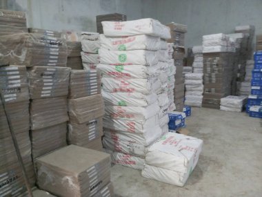 Raipur, Chattisgarh, India - 9th August 2019 : Maplitho and Copier Paper reams are stacked up inside a paper godown.