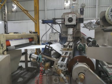 Kolkata, West Bengal, India - 26th March 2019 : Paper blanks are being manufactured before being used as walls of Paper cups. Indian paper cup making industry is growing.