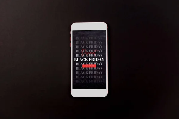 Smartphone Auf Dem Schreibtisch Gegen Black Friday Werbung Konzept Für — Stockfoto