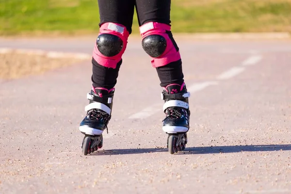 Enjoying roller skating rollerblading on inline skates. Copy space