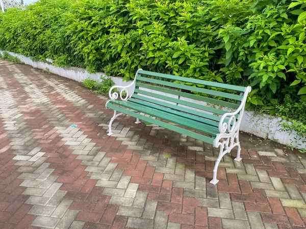 Beautiful Bench Painted Green White Placed Park Quite Green Surroundings — Stock Photo, Image
