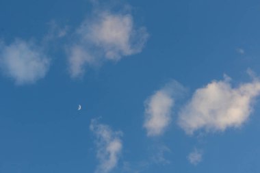 Pattern of clouds forming in blue sky creating an abstract background