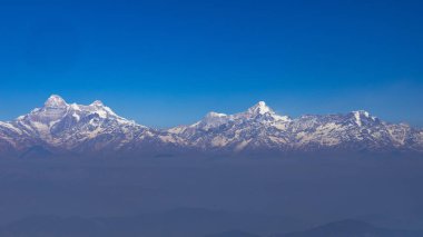 A Post card Panoramic view of the snow covered Himalayan peaks of the Nanda Devi mountain range
