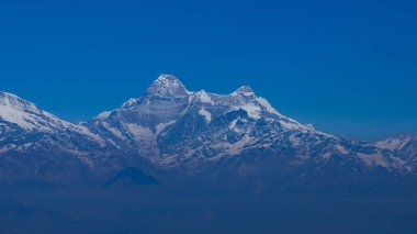 A Post card Panoramic view of the snow covered Himalayan peaks of the Nanda Devi mountain range