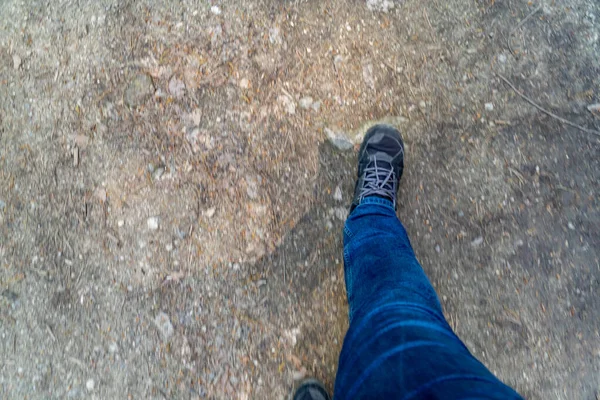 Top View Person Wearing Jeans Sneakers Walking Footpath — Stock Photo, Image