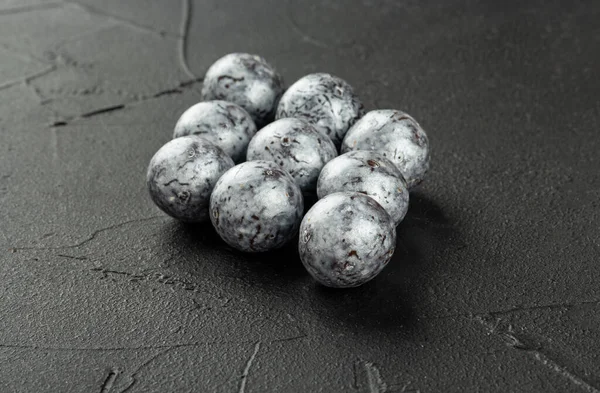 Silver Candies Hazelnuts Chocolate Form Rhombus Dark Concrete Background — Φωτογραφία Αρχείου