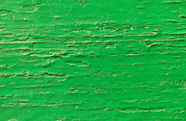 Ahşap arka plan, çatlamış yeşil boya, yakın plan..