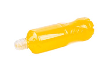 Lying plastic bottle with orange isotonic drink for sport isolated on white background. 