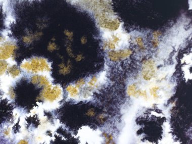 Parlak kıvılcımlı siyah ve altın rengi mürekkep dokusu tasarım için dekoratif arka plan.