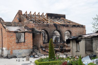 Irpin, Kyiv Region, Ukraine, 14.05.2022. A destroyed house burned down as a result of a Russian army shell hitting it