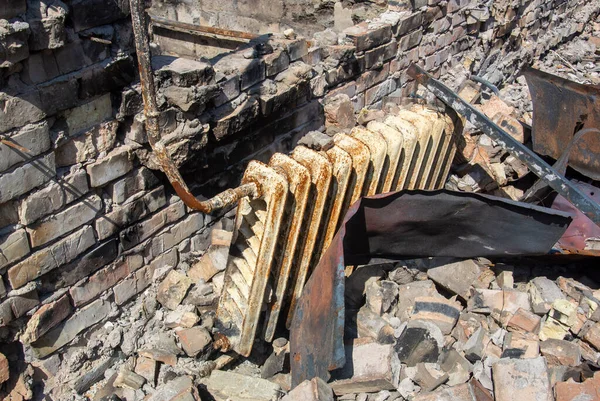 A heating radiator that survived in a destroyed house after being hit by a Rashist shell in a private house in Irpin, Ukraine.