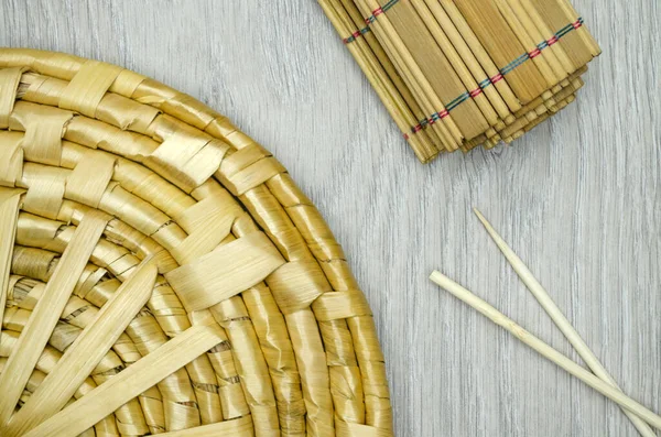 Bamboo Mat Straw Plate Grey Wood Background — Stock Photo, Image
