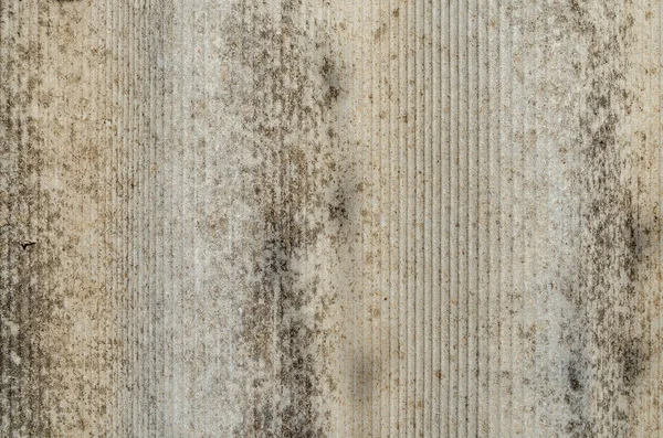 Kas lekeleri ve noktalarıyla eski sarı tahta dalga çimento.