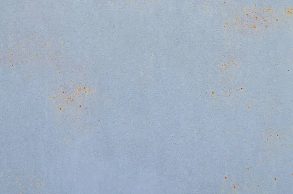 Paslı arkaplanı olan eski metal levha