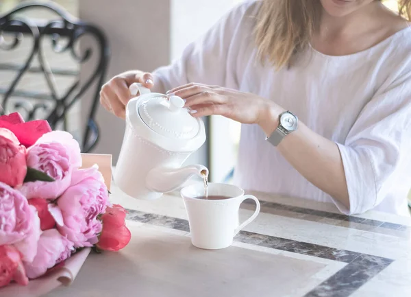 Young Woman Pours Tea Beautiful White Teapot Ceramic Cup Stockbild