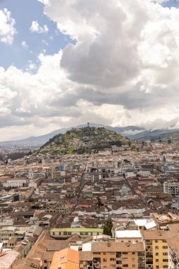 beautiful landscape of the city of Quito-Ecuador in Latin America, architecture with mountain in the background and sky with clouds, panoramic scene on a sunny day, wallpaper