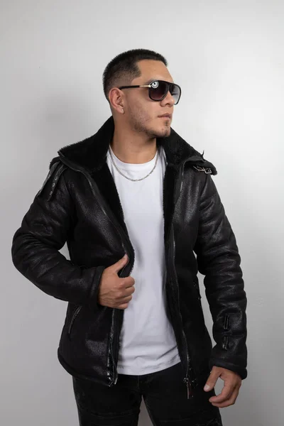 Attractive Latin Young Man Modeling Trendy Modern Clothes Wears Leather Stock Image