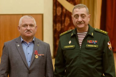 Moskova, Rusya - 13.02.2019: Rus Muhafızların Merkez Bölgesi karargahı, Afganistan 'daki Sovyet birliklerinin geri çekilmesinin 30. yıldönümünde asker ve çalışanları ve gazileri tebrik etti.
