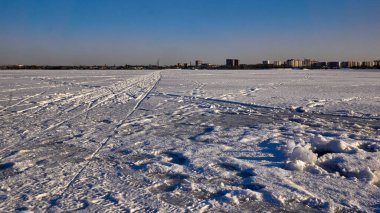 Tracks from sledges and skis across the ice of the Voronezh reservoirs during the New Year's weekend.