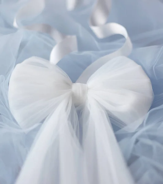 White Tulle Bow Belt Satin Ribbon Baby Blue Backgroung Wedding — Stock Photo, Image